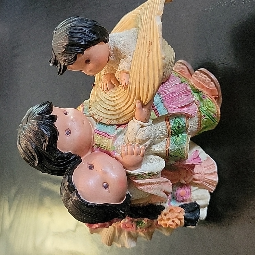 Enseco Corporation figurine